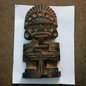 African tribal solid wood piece..artist unknown..original collectable choice